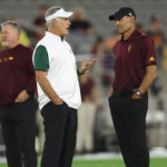 TEMPE, ARIZONA - SEPTEMBER 17: Head coaches Chris Creighton of the Eastern Michigan Eagles and Herm Edwards of the Arizona State Sun Devils talk before the start of the NCAAF game at Sun Devil Stadium on September 17, 2022 in Tempe, Arizona. (Photo by Christian Petersen/Getty Images)