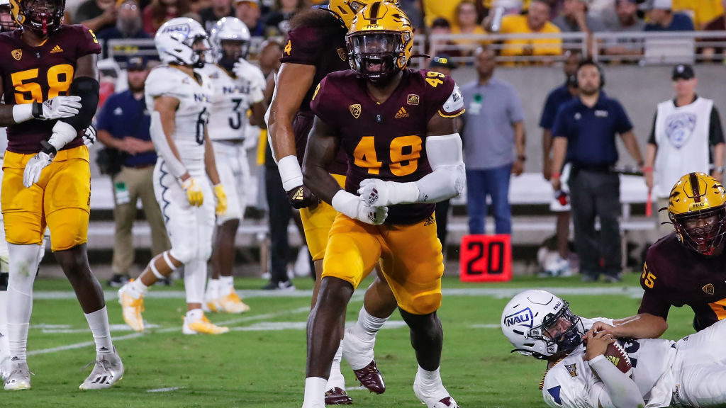 Arizona State Sun Devils defensive lineman Travez Moore (49) celebrates a big play during the colle...