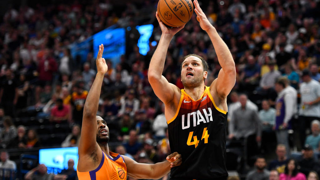 Bojan Bogdanovic #44 of the Utah Jazz shoots over Chris Paul #3 of the Phoenix Suns during the seco...