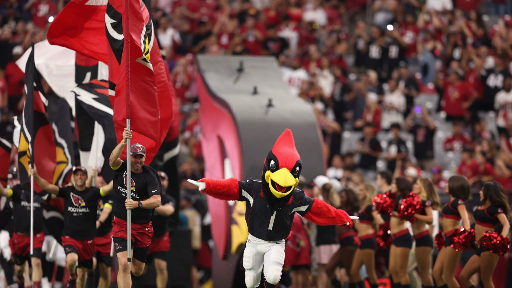 Arizona Cardinals mascot, "Big Red" leads teammates onto the field before the NFL preseason game ag...
