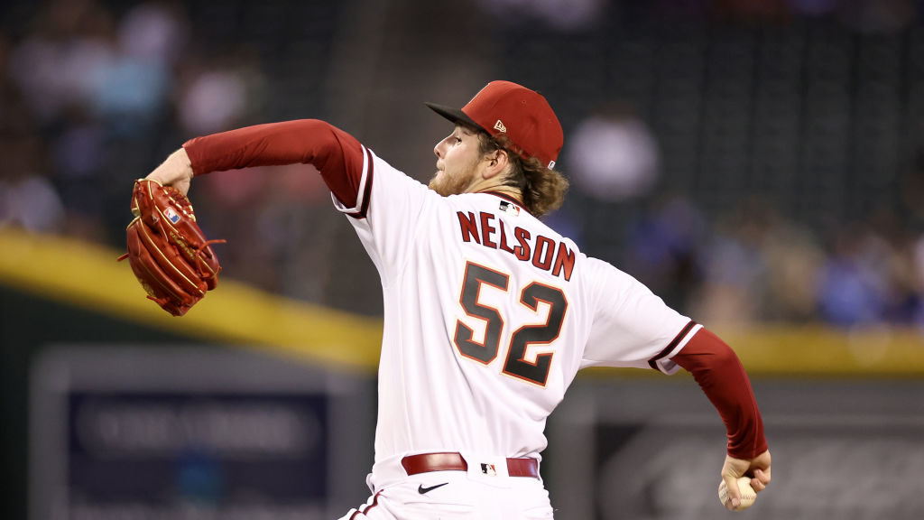 Ryne Nelson #52 of the Arizona Diamondbacks pitches against the Los Angeles Dodgers in the first in...