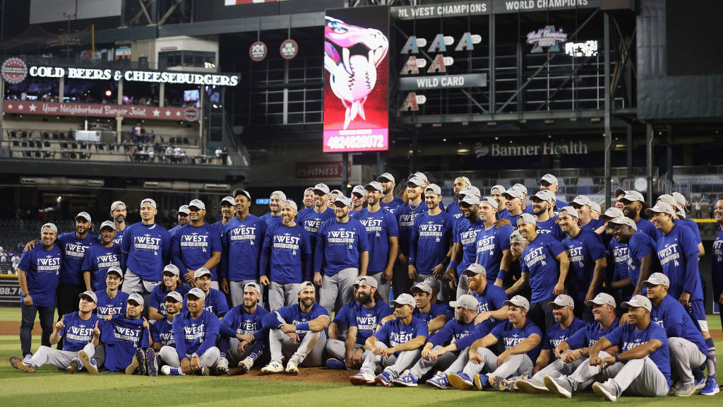 The Los Angeles Dodgers pose for a team photo after defeating the Arizona Diamondbacks in the MLB g...
