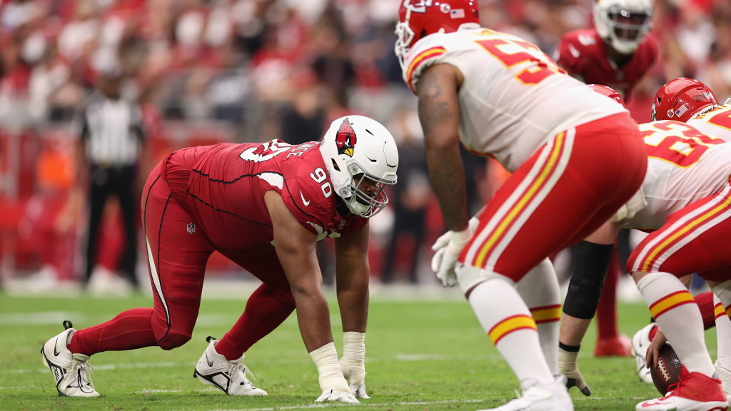 Defensive tackle Rashard Lawrence #90 of the Arizona Cardinals lines up during the NFL game at Stat...