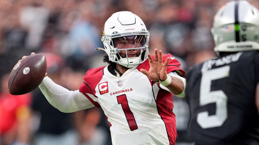 Kyler Murray #1 of the Arizona Cardinals throws a pass for a two-point conversion in the fourth qua...