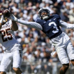 Penn State cornerback Johnny Dixon (3) breaks up a pass intended for Central Michigan wide receiver Noah Koenigsknecht (25) during the second half of an NCAA college football game, Saturday, Sept. 24, 2022, in State College, Pa. (AP Photo/Barry Reeger)