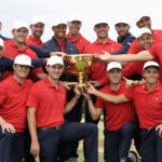 
              FILE - The U.S. team hold their trophy after they won the Presidents Cup golf tournament at Royal Melbourne Golf Club in Melbourne, Sunday, Dec. 15, 2019. The U.S. team won the tournament 16-14. The last Presidents Cup was so close the International team walked away with renewed hope that it had enough game and enough fight to conquer the mighty Americans. (AP Photo/Andy Brownbill, File)
            