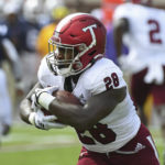 
              Troy running back Kimani Vidal (28) runs the ball during the first half an NCAA college football game against Mississippi in Oxford, Miss., Saturday, Sept. 3, 2022. (AP Photo/Thomas Graning)
            