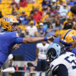 
              Pittsburgh quarterback Kedon Slovis (9) passes against Rhode Island during the first half of an NCAA college football game, Saturday, Sept. 24, 2022, in Pittsburgh. (AP Photo/Keith Srakocic)
            