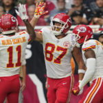 
              Kansas City Chiefs tight end Travis Kelce (87) celebrates with teammates after scoring a touchdown against the Arizona Cardinals during the first half of an NFL football game, Sunday, Sept. 11, 2022, in Glendale, Ariz. (AP Photo/Matt York)
            
