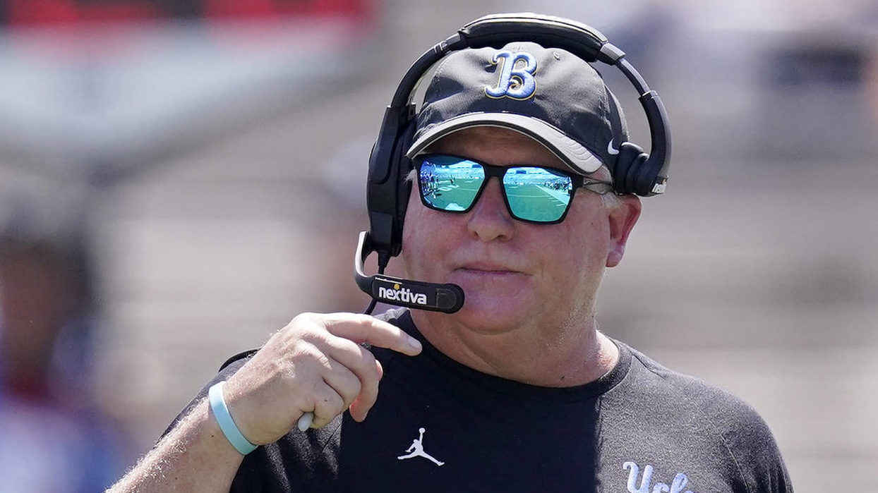 UCLA head coach Chip Kelly watches from the sideline during the first half of an NCAA college footb...