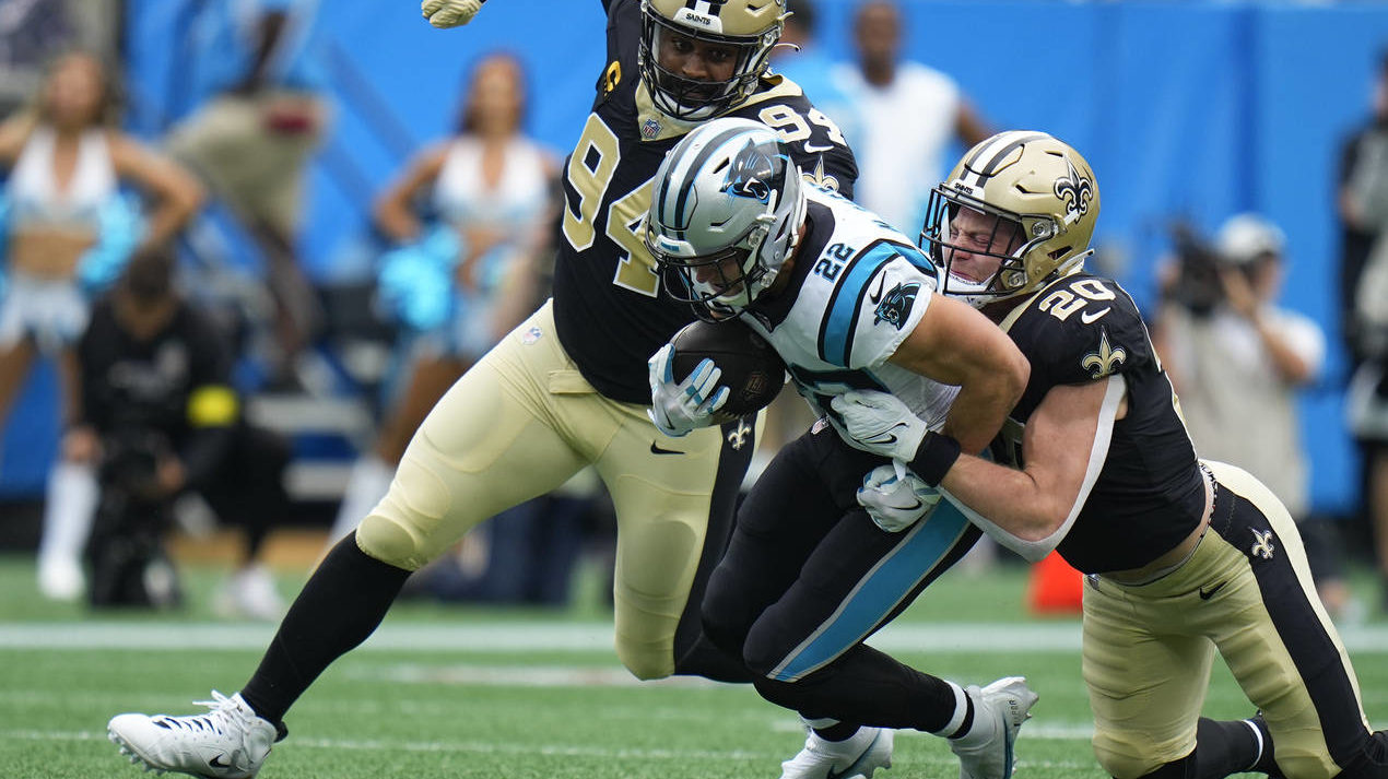 Carolina Panthers running back Christian McCaffrey (22) carries the ball against New Orleans Saints...