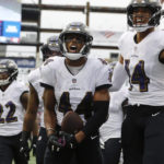 
              Baltimore Ravens cornerback Marlon Humphrey (44) celebrates with cornerback Damarion Williams (22) and safety Kyle Hamilton (14) after his interception in the second half of an NFL football game against the New England Patriots, Sunday, Sept. 25, 2022, in Foxborough, Mass. (AP Photo/Paul Connors)
            