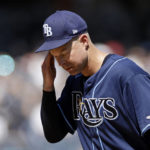 Tampa Bay Rays pitcher Corey Kluber reacts during the first inning of the team's baseball game against the New York Yankees on Saturday, Sept. 10, 2022, in New York. (AP Photo/Adam Hunger)