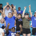 
              Middle Tennessee fans cheer during the second half of an NCAA college football game against Miami, Saturday, Sept. 24, 2022, in Miami Gardens, Fla. (AP Photo/Wilfredo Lee)
            