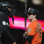 San Francisco Giants' Mike Yastrzemski (5) reacts after being called out on strikes by umpire CB Bucknor during the sixth inning of the team's baseball game against the Arizona Diamondbacks in San Francisco, Friday, Sept. 30, 2022. (AP Photo/Godofredo A. Vásquez)