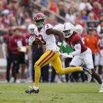 
              Southern California wide receiver Jordan Addison (3) runs after catching a pass to score a 22-yard touchdown against Stanford during the first half of an NCAA college football game in Stanford, Calif., Saturday, Sept. 10, 2022. (AP Photo/Godofredo A. Vásquez)
            