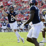 Mississippi quarterback Jaxson Dart (2) releases a pass to tight end Michael Trigg (0) during the first half of an NCAA college football game against Tulsa in Oxford, Miss., Saturday, Sept. 24, 2022. (AP Photo/Thomas Graning)