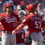 
              Cincinnati Reds' Stuart Fairchild (57) is congratulated by teammate Nick Senzel (15) after hitting a two-run home run during the sixth inning of a baseball game against the St. Louis Cardinals Sunday, Sept. 18, 2022, in St. Louis. (AP Photo/Jeff Roberson)
            