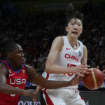 United States' Chelsea Gray , left, knocks the ball out of China's Han Xu hands during their gold medal game at the women's Basketball World Cup in Sydney, Australia, Saturday, Oct. 1, 2022. (AP Photo/Mark Baker)