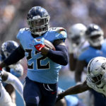 
              Tennessee Titans running back Derrick Henry (22) carries the ball against the Las Vegas Raiders in the first half of an NFL football game Sunday, Sept. 25, 2022, in Nashville, Tenn. (AP Photo/John Amis)
            