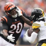 Pittsburgh Steelers wide receiver Diontae Johnson (18) is tackled by Cincinnati Bengals cornerback Eli Apple (20) during the first half of an NFL football game, Sunday, Sept. 11, 2022, in Cincinnati. (AP Photo/Jeff Dean)