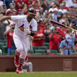 
              St. Louis Cardinals' Albert Pujols tosses his bat after flying out during the ninth inning of a baseball game against the Cincinnati Reds Sunday, Sept. 18, 2022, in St. Louis. (AP Photo/Jeff Roberson)
            