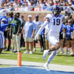 TCU tight end Jared Wiley (19) walks into the end zone to score during the first half of an NCAA college game against SNY on Saturday, Sept. 24, 2022, in Dallas, Texas. (AP Photo/Gareth Patterson)