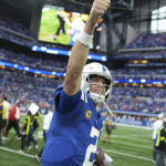 Indianapolis Colts' Matt Ryan celebrates to the fans after the Colts defeated the Kansas City Chiefs, 20-17, in an NFL football game, Sunday, Sept. 25, 2022, in Indianapolis. (AP Photo/AJ Mast)