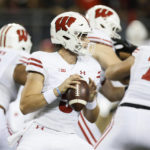 
              Wisconsin quarterback Graham Mertz drops back to pass against Ohio State during the first half of an NCAA college football game Saturday, Sept. 24, 2022, in Columbus, Ohio. (AP Photo/Jay LaPrete)
            