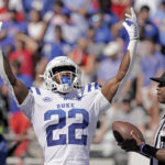 Duke running back Jaylen Coleman celebrates after scoring a touchdown during the first half of an NCAA college football game against Kansas Saturday, Sept. 24, 2022, in Lawrence, Kan. (AP Photo/Charlie Riedel)