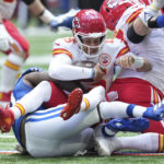 
              Kansas City Chiefs quarterback Patrick Mahomes (15) is sacked by Indianapolis Colts defensive end Yannick Ngakoue (91) during the first half of an NFL football game, Sunday, Sept. 25, 2022, in Indianapolis. (AP Photo/AJ Mast)
            