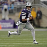 
              Kansas State quarterback Adrian Martinez looks to pass during the first half of an NCAA college football game against Missouri Saturday, Sept. 10, 2022, in Manhattan, Kan. (AP Photo/Charlie Riedel)
            