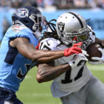 
              Tennessee Titans safety Kevin Byard (31) pushes Las Vegas Raiders wide receiver Davante Adams (17) out of bounds in the second half of an NFL football game Sunday, Sept. 25, 2022, in Nashville, Tenn. (AP Photo/Mark Zaleski)
            