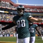
              Philadelphia Eagles tight end Dallas Goedert (88) celebrates his touchdown against the Washington Commanders during the first half of an NFL football game, Sunday, Sept. 25, 2022, in Landover, Md. (AP Photo/Nick Wass)
            