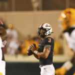 Oklahoma State quarterback Spencer Sanders (3) looks for an open teammate during the second half of an NCAA college football game against Arizona State, Saturday, Sept. 10, 2022, in Stillwater, Okla. (AP Photo/Brody Schmidt)