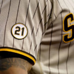 A "21" patch in honor of the late Roberto Clemente is seen on a San Diego Padres jersey during the fifth inning of a baseball game against the Arizona Diamondbacks, Thursday, Sept. 15, 2022, in Phoenix. (AP Photo/Matt York)