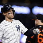 New York Yankees' Aaron Judge reacts after being walked during the sixth inning of the team's baseball game against the Baltimore Orioles on Friday, Sept. 30, 2022, in New York. (AP Photo/Adam Hunger)
