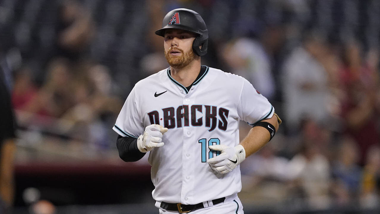 Arizona Diamondbacks' Carson Kelly rounds the bases after hitting a home run against the San Diego ...