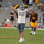 Eastern Michigan's Gunnar Oakes (82) celebrate their 30-21 win over Arizona State's at the end of an NCAA college football game Saturday, Sept. 17, 2022, in Tempe, Ariz. (AP Photo/Darryl Webb)