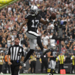 
              Las Vegas Raiders wide receiver Davante Adams (17) celebrates after a touchdown reception during the first half of an NFL football game against the Arizona Cardinals Sunday, Sept. 18, 2022, in Las Vegas. (AP Photo/David Becker)
            