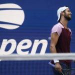 Karen Khachanov, of Russia, reacts during competition against Casper Ruud, of Norway, during the semifinals of the U.S. Open tennis championships, Friday, Sept. 9, 2022, in New York. (AP Photo/John Minchillo)