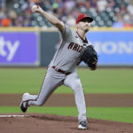 Arizona Diamondbacks starting pitcher Zach Davies throws against the Houston Astros during the first inning of a baseball game Tuesday, Sept. 27, 2022, in Houston. (AP Photo/Michael Wyke)