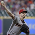 Arizona Diamondbacks starting pitcher Zach Davies throws against the Houston Astros during the first inning of a baseball game Tuesday, Sept. 27, 2022, in Houston. (AP Photo/Michael Wyke)