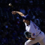 Chicago Cubs starting pitcher Keegan Thompson delivers in the late afternoon sun during the eighth inning of a baseball game against the Philadelphia Phillies, Thursday, Sept. 29, 2022, in Chicago. (AP Photo/Charles Rex Arbogast)