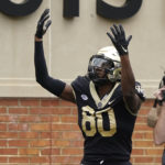 
              Wake Forest wide receiver Jahmal Banks (80) celebrates his touchdown catch against Clemson during the first half of an NCAA college football game in Winston-Salem, N.C., Saturday, Sept. 24, 2022. (AP Photo/Chuck Burton)
            