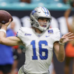
              Middle Tennessee quarterback Chase Cunningham (16) passes during the first half of an NCAA college football game against Miami, Saturday, Sept. 24, 2022, in Miami Gardens, Fla. (AP Photo/Wilfredo Lee)
            
