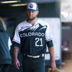 
              Colorado Rockies starting pitcher Kyle Freeland walks into the dugout after being removed from a baseball game in the third inning against the San Diego Padres, Sunday, Sept. 25, 2022, in Denver. (AP Photo/Geneva Heffernan)
            