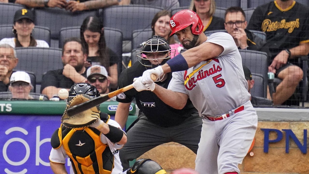 St. Louis Cardinals' Albert Pujols (5) hits a two-run home run off Pittsburgh Pirates relief pitche...