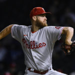 
              Philadelphia Phillies starter Zack Wheeler winds up during the first inning of the team's baseball game against the Chicago Cubs on Tuesday, Sept. 27, 2022, in Chicago. (AP Photo/Paul Beaty)
            