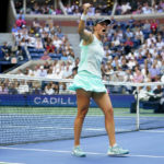 
              Iga Swiatek, of Poland, reacts after scoring a point against Ons Jabeur, of Tunisia, during the women's singles final of the U.S. Open tennis championships, Saturday, Sept. 10, 2022, in New York. (AP Photo/Frank Franklin II)
            